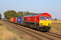 DB Schenker livery 66097 at East Goscote on 3.10.11 with 4Z32 Corby - Bescot return trial empty Intermodal of just 6 containers