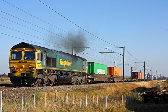 66517 clags past at Claypole having just departed the loop heading towards Newark on 28.9.11 with 4E24 1039 Thamesport -  Leeds Intermodal