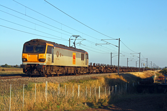 Grey 92037 at Claypole heading towards Newark on 28.9.11 with 4E32 1152 Dollands Moor - Doncaster Belmont  empty steel carriers