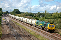 66957 at Meadow Lane, Loughborough on 8.9.11 with 6L87 Earles Sidings - West Thurrock loaded PCA cement tanks