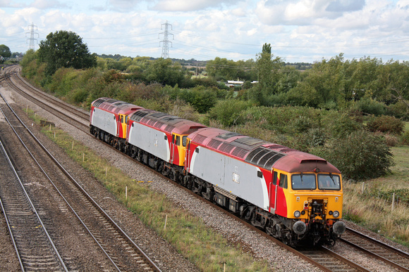 57301 drags 57303 and 57305 at Meadow Lane Loughborough on 8.9.11 with 0Z47 1000 Wembley - Loughborough Brush for mods to their Dellner couplers and repaint into Network Rail yellow