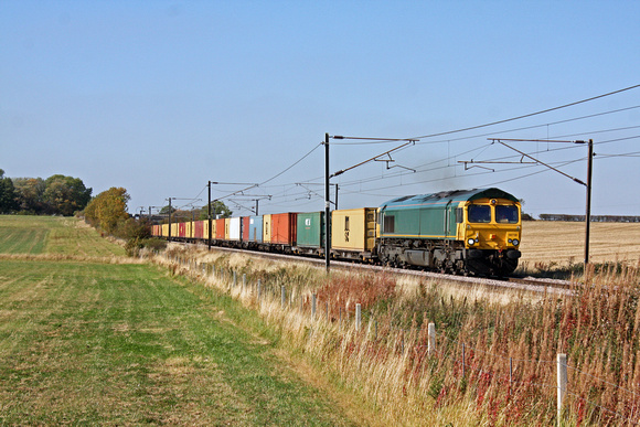 Ex Freightliner now GBRf 66738 at Stubton heading towards Grantham on 28.9.11 with 4L78 1143 Selby - Felixstowe  freigthliner