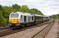 Silver skip 67029 with DVT 82146 at rear dashes past  Syston South Junction on 14.9.11  with 5Z05 0957 Toton TMD - Toton TMD via Leicester test working