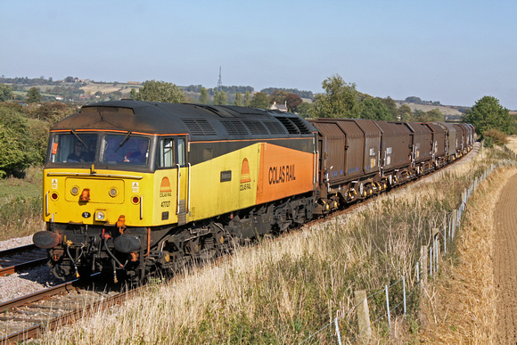 47727 approaches Hough Lane Crossing near Barkston, Grantham on 28.9.11 with 6M08 1314 Boston Docks - Washwood Heath loaded steel carriers