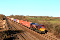 DB Cargo Class 66 No 66103 passes Cossington, MML on 15.1.24 with 4L38 1055 East Mids Gateway Tml Dbc to Felixstowe North Dbc Intermodal