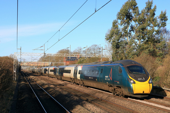 Avanti West Coast  Class 390 Pendolino No 390118 passes Cathiron near Rugby, WCML on 16.1.24 with 1A28 1043 Liverpool Lime Street to London Euston service