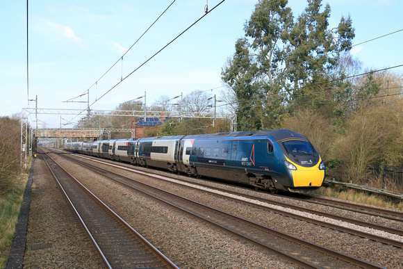 Avanti West Coast  Pendolino No 390136 passes Cathiron near Rugby, on the slowline due to engineering works, on 25.2.24 with 1A15 0935 Liverpool Lime Street to London Euston service