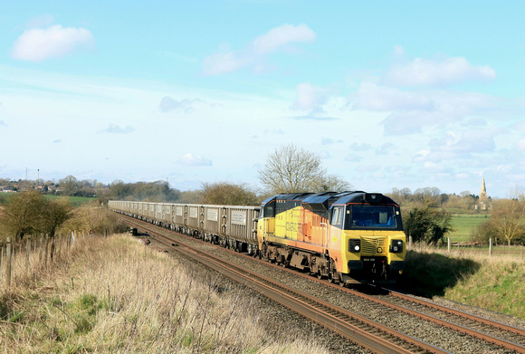 Colas Rail Class 70 No 70802 passes Copley's Brook, Melton Mowbray on 4.3.24 with 6L40 0840 Longport Lr Colas to Whitemoor Yard L.D.C Gbrf empty Land Recovery Ltd JNA Megaboxes for recycled stone