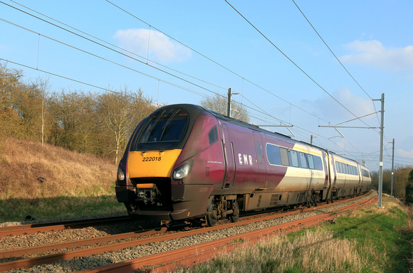 EMR Class 222 Meridian No 222018 powers past Braybrooke Road, Market Harborough, MML on 6.3.24 with 1D48 1435 St Pancras International to Nottingham service