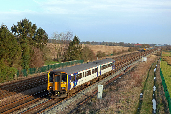 Northern Class 155 No 155344 passes Colton Junction on 15.1.20 with 2T12 1107 York to Leeds  service. In the distance is 66748 with  6D62 0919 Thrislington Gbrf to Scunthorpe Anchor (Gbrf)  loaded san