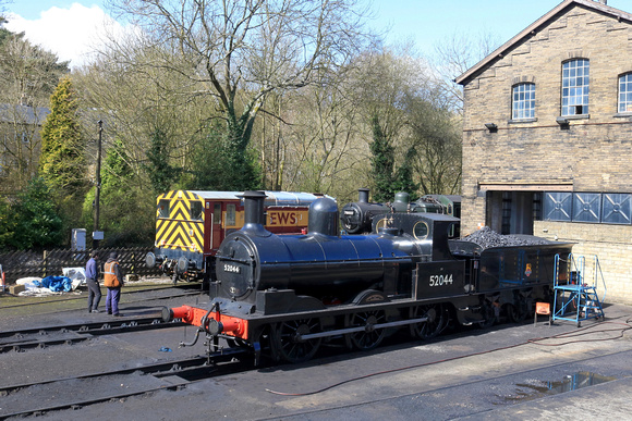 L&Y Class 25 0-6-0 No 52044 at Haworth Yard, K&WVR on 24.3.24. This loco numbered 957 starred in the film The Railway Children. Also seen is 08993 'Ashburnham' &  Standard Class 2 78022