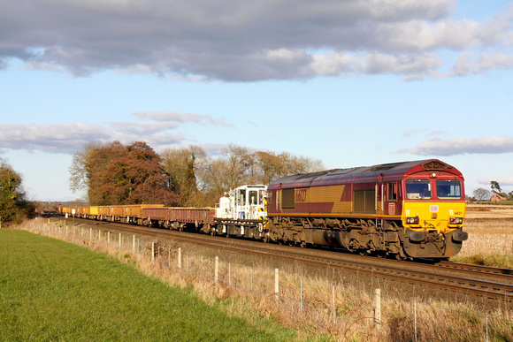 66127 tnt 66132 crawls through East Goscote heading towards Sysyton East Junction on 28.2.16 with 7G02 1130 Sandy - Toton North Yard engineers train running some 130 mins late