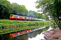 20227 and 20118 alongside the River Dart at Riverford on 11.6.06 with 1330 Totnes - Buckfastleigh service at the South Devon Railway  Diesel Gala June 2006