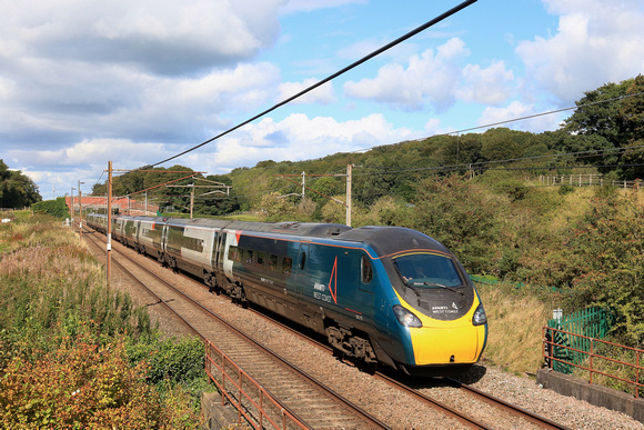 Avanti West Coast Pendolino Class 390 No 390117 passes Woodacre near Garstang on 12.9.24 with 1M12 1136 Glasgow Central to London Euston service