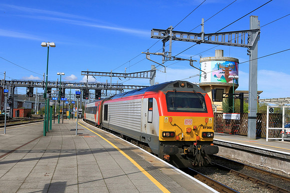 DB Cargo Class 67 No 67008 in TfW silver livery enters Cardiff Central station from Canton Sidings on 18.4.24 to form the 1W57 1052 Cardiff Central to Manchester Piccadilly service