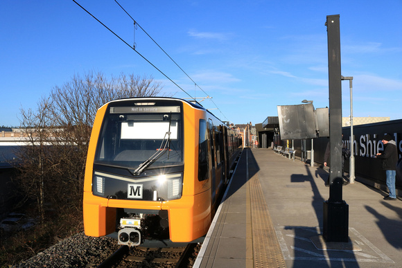 New Stadler Tyne and Wear Metro Class 555 No 555021 waits at South Shields station on 19.12.24, the second day of running of this first Metro train, with No 121 1208 South Shields towards St James via