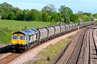 66302 heads north along the slowline of the MML at Hathern on 19.5.09 with 6A63 1544 Daw Mill Colliery - Ratcliffe Power Station loaded coal hoppers