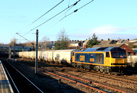 GBRf Class 60 No 60056 Great Gable passes the Tyne and Wear station of Pelaw on 10.1.25 with 6N19 0959 Lynemouth Power Stn (Gbrf) to Tyne Coal Terminal Gbrf empty Biomass hoppers