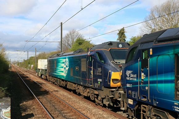 DRS Class 68 No 68017 Hornet & DRS Class 88 No 88006 Juno with one nuclear flask at.Boldon West Junction, Brockley Whins on 14.4.25 with 6E44 0738 Carlisle Kingmoor Sdg(Drs) to Seaton-o-t British Ener