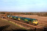A trio of Freightliner Class 66 loco's No's 66547, 66557 & 66593 pass Plawsworth heading towards Durham on 12.11.24 with 0D53 1346 Tyne S.S. to Leeds Balm Rd Loco (Fhh) move