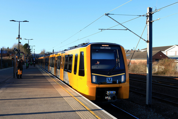 New Tyne and Wear Metro Stadler Class 555 No 555021 arrives at Pelaw on 19.12.24, the second day of running of this train in service with No 121 1034 St James to South Shields via the coast