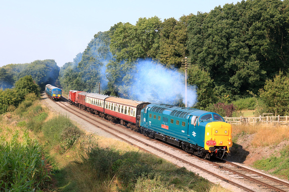 55019 Royal Highland Fusilier at Kinchley Lane on 6.9.24 with 1410 Loughborough to Rothley Brook parcels passes D123 dragging 3 Car Met Cam DMU working 1403 Rothley Brook to Loughborough at GCR Autumn