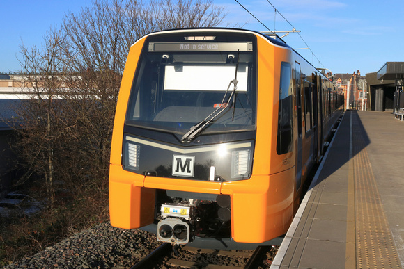 New Tyne and Wear Metro Stadler Class 555 No 555021 waits at South Shields station on 19.12.24, the second day of running of this first Metro train, with No 121 1208 South Shields towards St James via