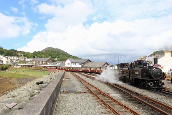 Double Fairlie 'James Spooner'  ready to depart Porthmadog station, Ffestiniog and Welsh Highland Railways on 14.6.24 with 1040  'Mountain Spirit' service to Bl. Ffestiniog