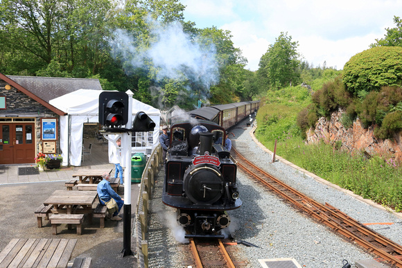 Double Fairlie 'James Spooner'  arrives at Tan-y-Bwlch station, Ffestiniog and Welsh Highland Railways on 14.6.24 with 1040  'Mountain Spirit' service from Porthmadog to Bl. Ffestiniog