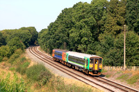 Class 153 No 153371 in London Midland livery and No 153308 in EMT livery at Kinchley Lane on 6.9.24 with 2C22 1310 Loughborough to Rothley Brook service at GCR Autumn Diesel Gala 2024