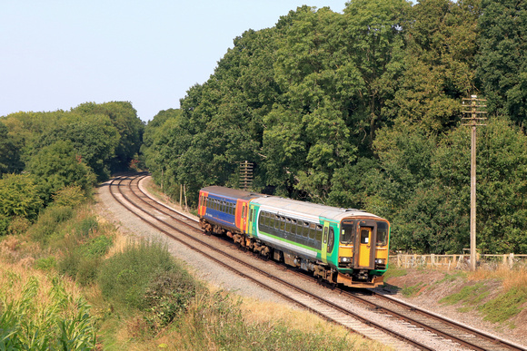 Class 153 No 153371 in London Midland livery and No 153308 in EMT livery at Kinchley Lane on 6.9.24 with 2C22 1310 Loughborough to Rothley Brook service at GCR Autumn Diesel Gala 2024