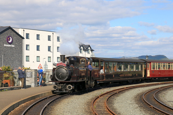 Double Fairlie 'James Spooner with Eryri-Snowdonia  a 1st class Pullman Observation carriage arrives  at Porthmadog station, Ffestiniog and Welsh Highland Railways with 1625 Bl. Ffestiniog to Porthmad