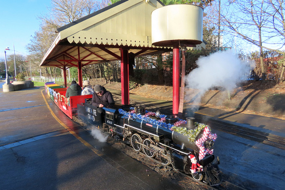 A.T. & S.F. Santa Fe 3440, at Lakeshore Railroad, South Marine Park Minature Railway, South Shields seen on 1.12.24 steaming away from the terminus dresses for Christmas