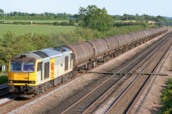 60091 in EWS 2 tone grey livery at Cossington, MML heading north towards Sileby Junction on 30.7.08 with 6E38 1354 Colnbrook - Lindsey Oil Refinery empty bogie tanks