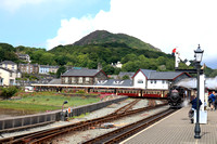 Double Fairlie 'James Spooner'  departs Porthmadog station, Ffestiniog and Welsh Highland Railways on 14.6.24 with 1040  'Mountain Spirit' service to Bl. Ffestiniog