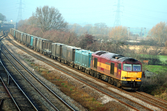 60045 at Meadow Lane Loughborough on  21.12.06 with 6Z88 Drax - Hotchley Hill loaded Gypsum containers running via Humberstone Road, Leicester
