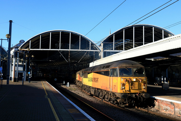 Colas Rail Class 56 No 56105 and Colas Rail Class 66 No 66849 Wylam Dilly bursts out into the sunlight at Newcastle station on 30.1.25 with 6S31 0635 Doncaster Up Decoy to Millerhill S.S. departmental