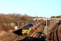 Colas Rail Class 70 No 70812 at Pelaw on 24.2.25 with 6D43 1541 Jarrow Prax to Lindsey Oil Refinery Colas empty bogie tanks passing alongside the Tyne and Wear Metro line to South Shields & Sunderland