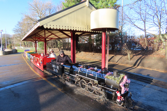 A.T. & S.F. Santa Fe 3440, at Lakeshore Railroad, South Marine Park Minature Railway, South Shields on 1.12.24 steaming away from the terminus dresses for Christmas